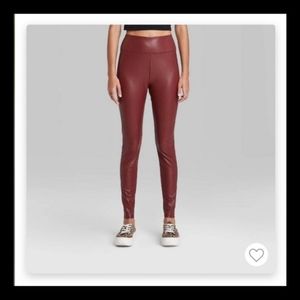 Women’s high waisted faux leather leggings in a beautiful burgundy.